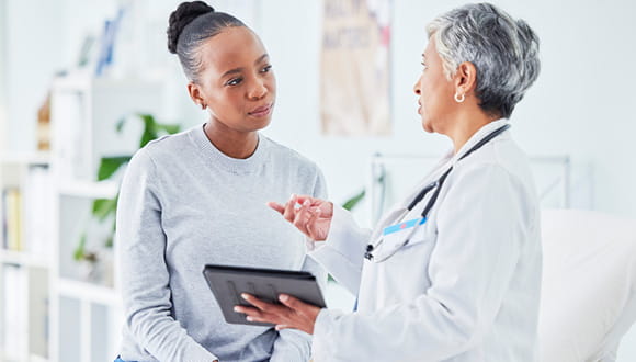 person talking to doctor