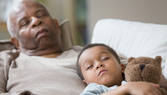 Man sleeping with grandchild