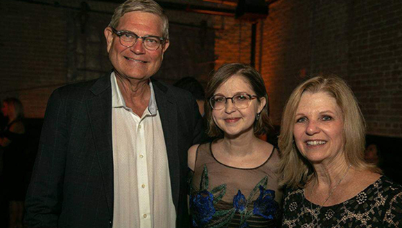 Tara Goodwin, multi-organ transplant patient, with her parents