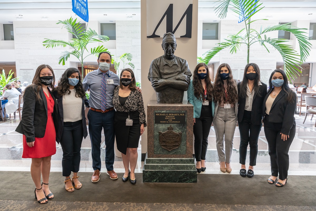 image of 4 DeBakey CV interns and 4 project specialists, masked 