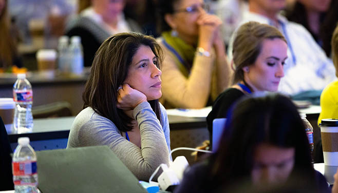 An attendee looks on with interest at the Heart Failure Summit.