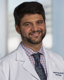headshot of Abhishek H. Kansara, MD, MPH, FACE 