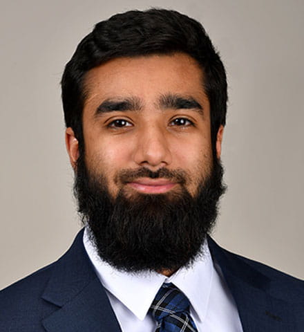 headshot of Dr Kalair