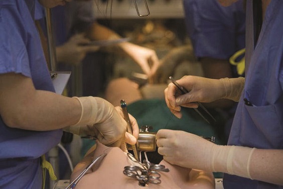 Students perform simulation surgery training