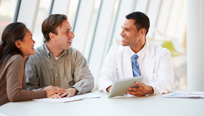 Physician providing face-to-face consultation to patients