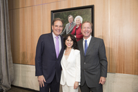 Photo (left to right) CBS Sports Commentator Jim Nantz, Maria Bush and Neil Bush stand in front of a portrait of Barbara and President George H.W. Bush at the naming ceremony of the Barbara and President George H.W. Bush Atrium at the new Walter Tower at Houston Methodist Hospital.