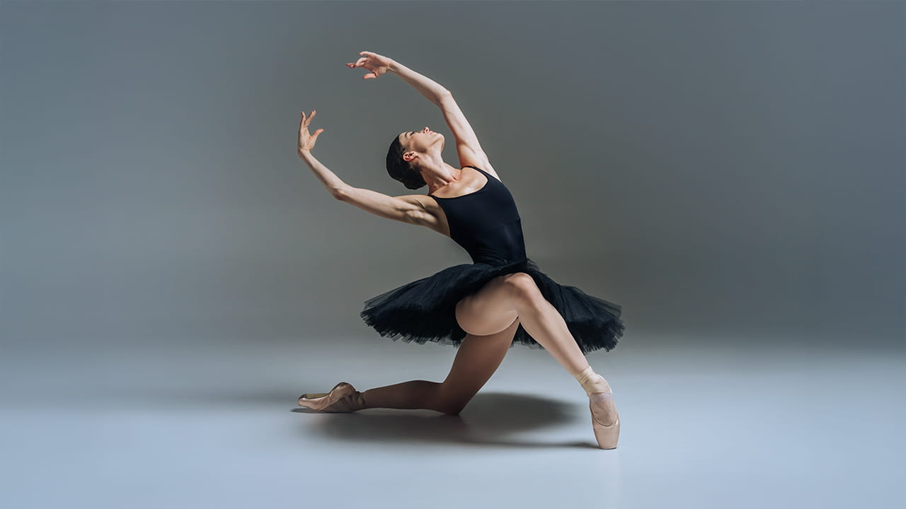 Still image of ballet dancers performing on stage, taken from video about Houston Methodist/Houston Ballet Sports Medicine Partnership.