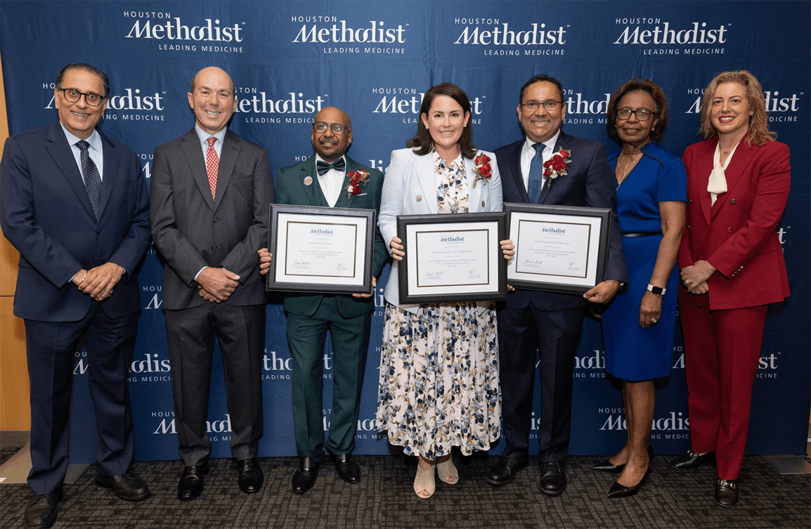 A picture of the Katz scholars with their awards and executive and board members