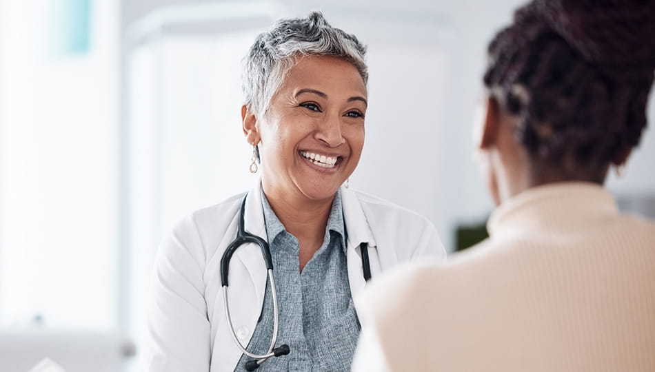 smiling doctor with patient
