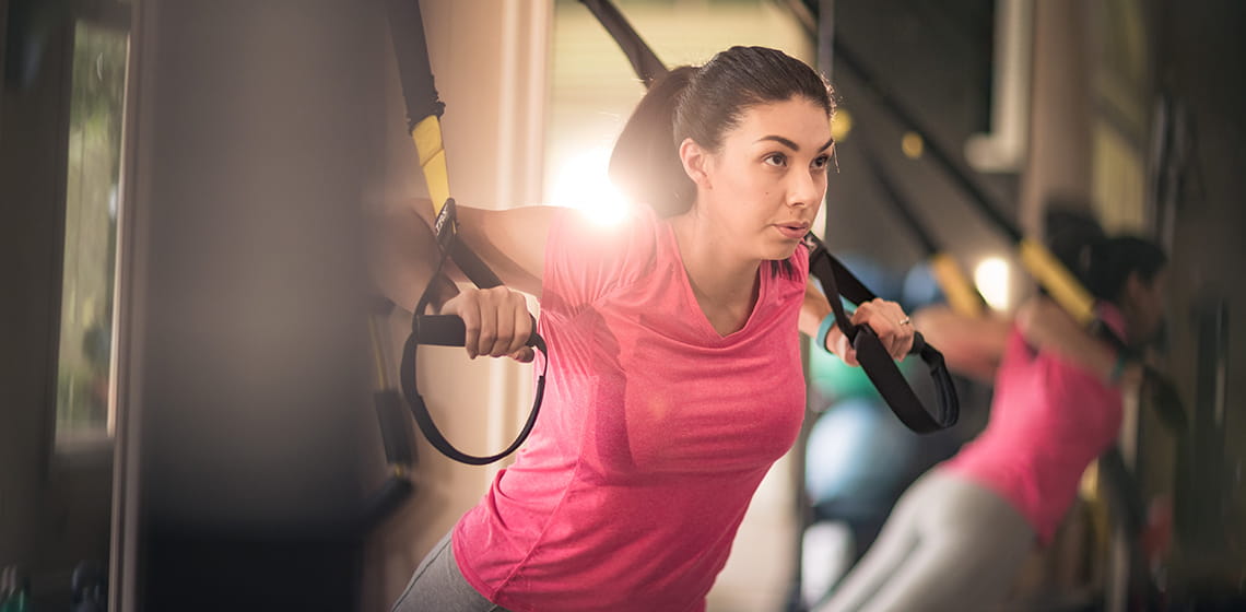 woman exercising using shoulders