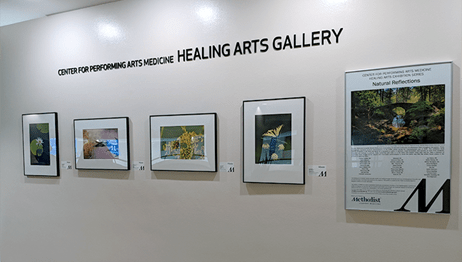 Wall with pictures from Healing Arts Exhibition