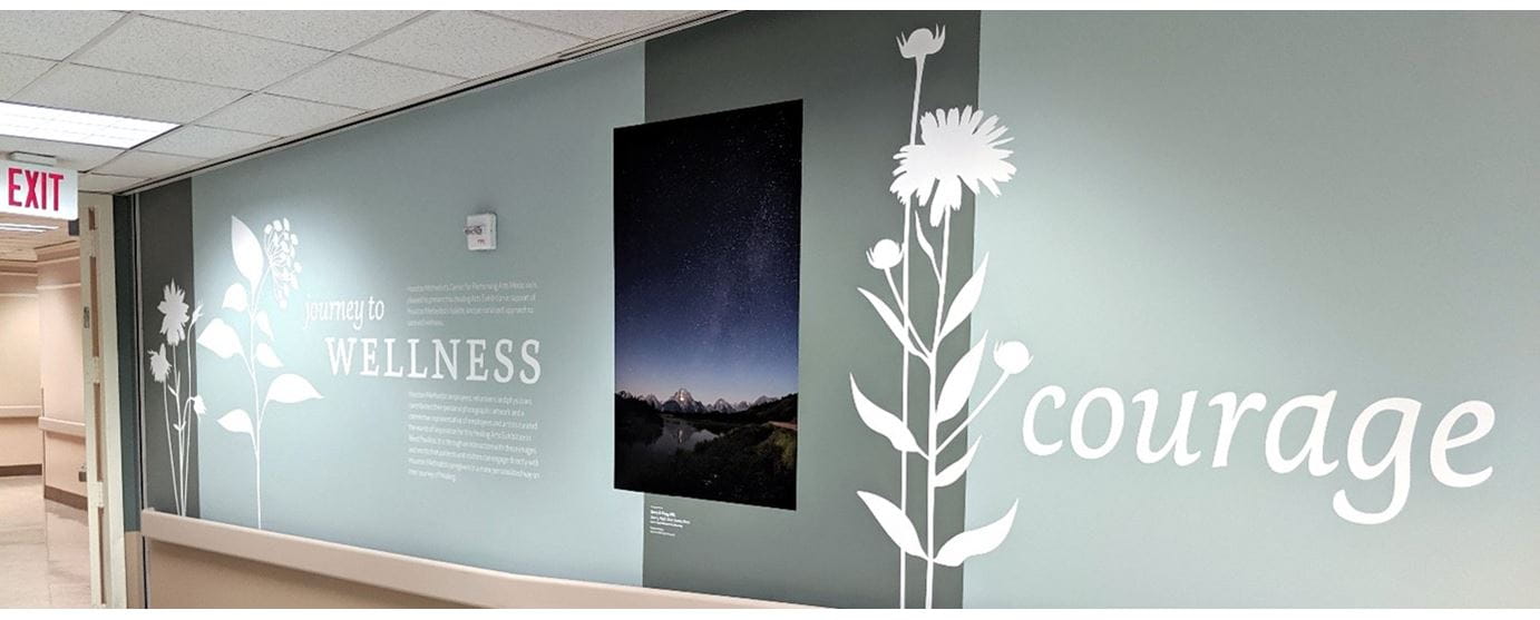 Houston Methodist West Pavilion crosswalk decorated with nature photographs and short words such as "courage"