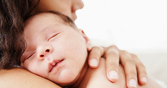 Mother with newborn baby