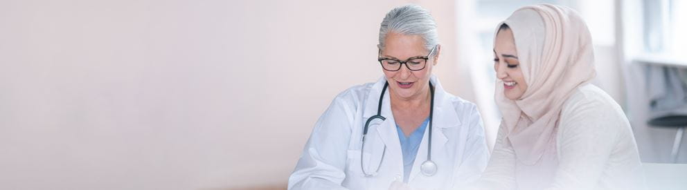 Female doctor with patient