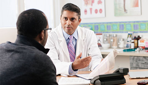 Doctor and male patient in clinic