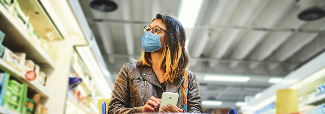 Woman Wearing Mask in Grocery Store