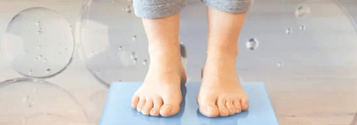 Women standing on scale